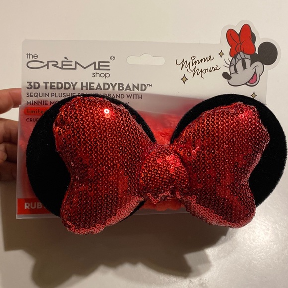 the Crème Shop Accessories - NEW Minnie Mouse 3D Teddy Headband. Has red sequins and black ears.